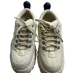 Stylish Cream Sneakers with Silver Accents